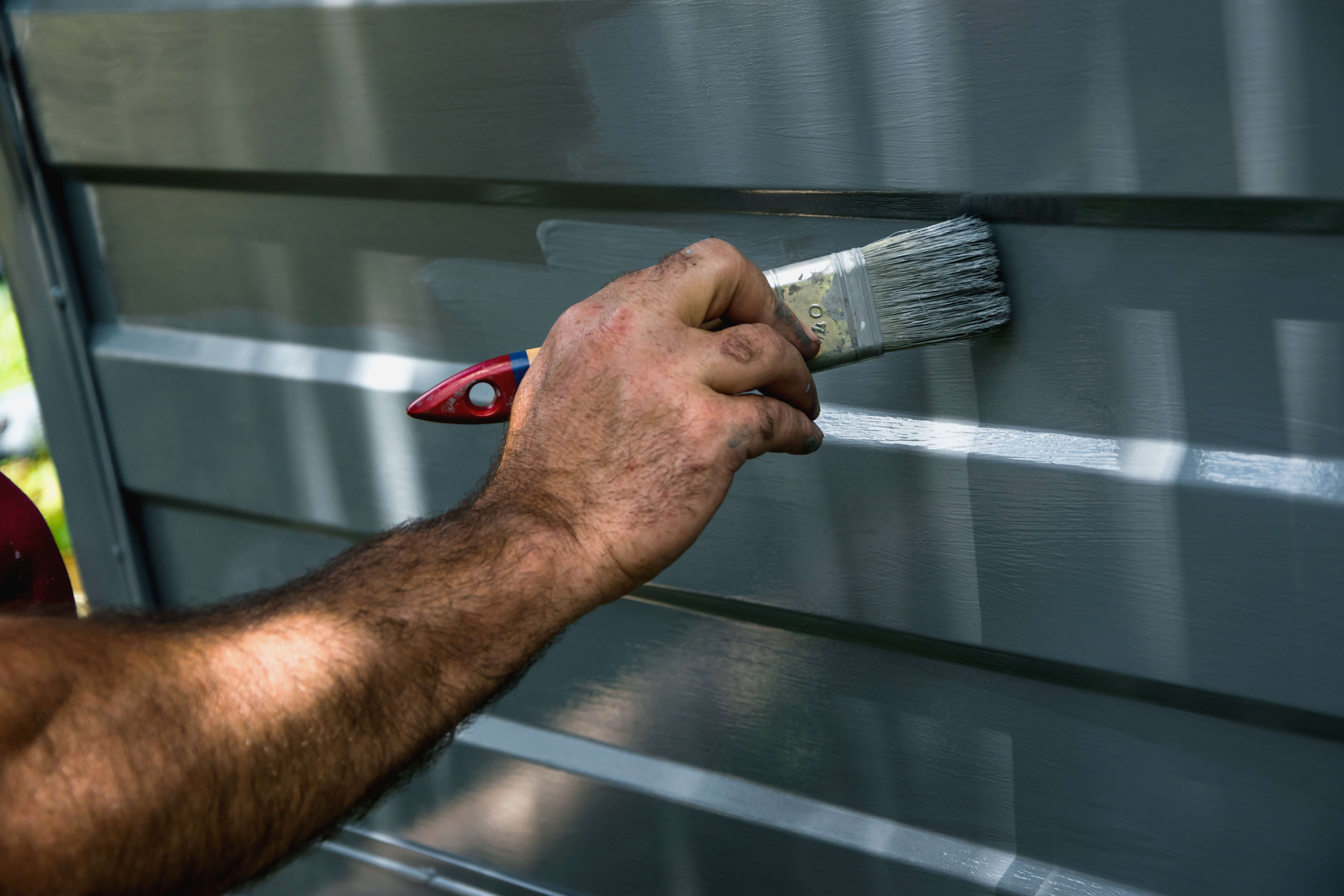 How to paint a metal garage door